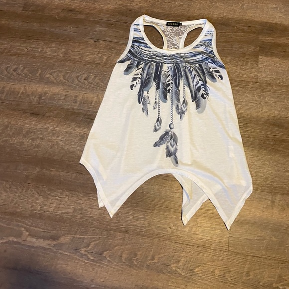 White and blue top. - Picture 1 of 4